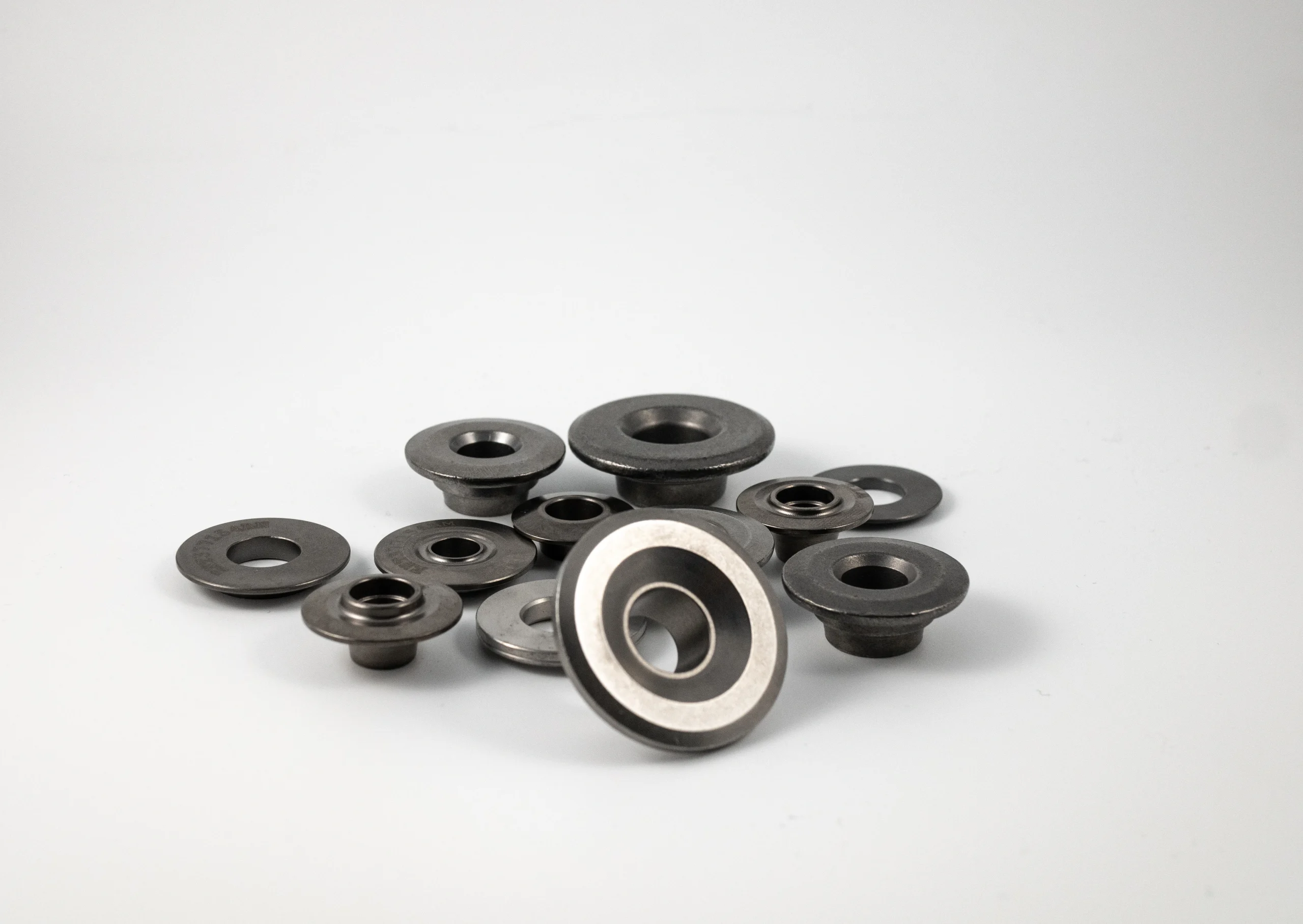 Valve spring retainers